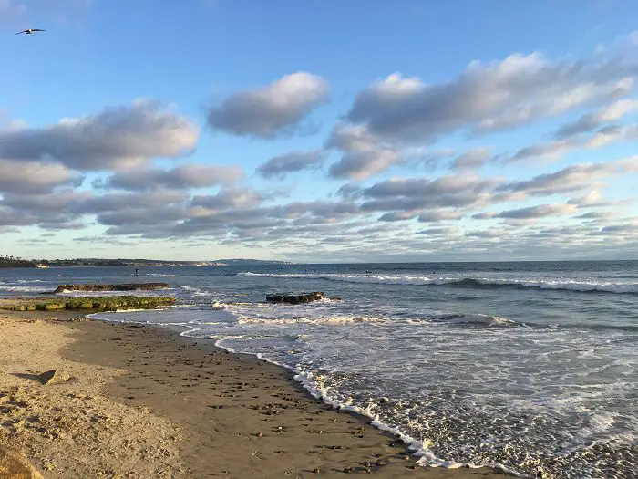 surf on the sand at swami's beach on a sunny day