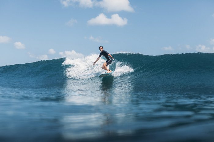 Beaches in San Diego - man surfing a small wave