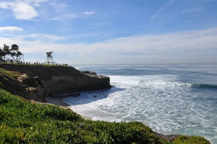 La Jolla shores coastline with cliffs and blue sky - beginner surf spots in san diego