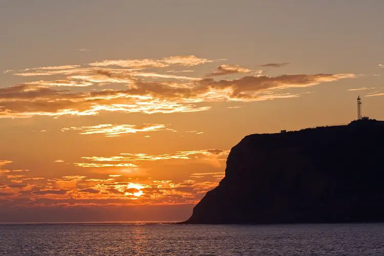 Gorgeous orange sunset with Point Loma and the ocean - beaches in San Diego