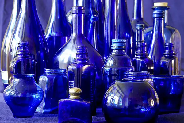 several cobalt blue bottles - dark blue sea glass origin